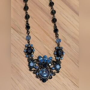 Elegant Blue and Black Necklace From 2028